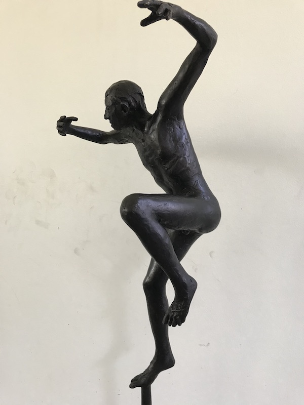 Male Jumping Figure on Pin (black patination)