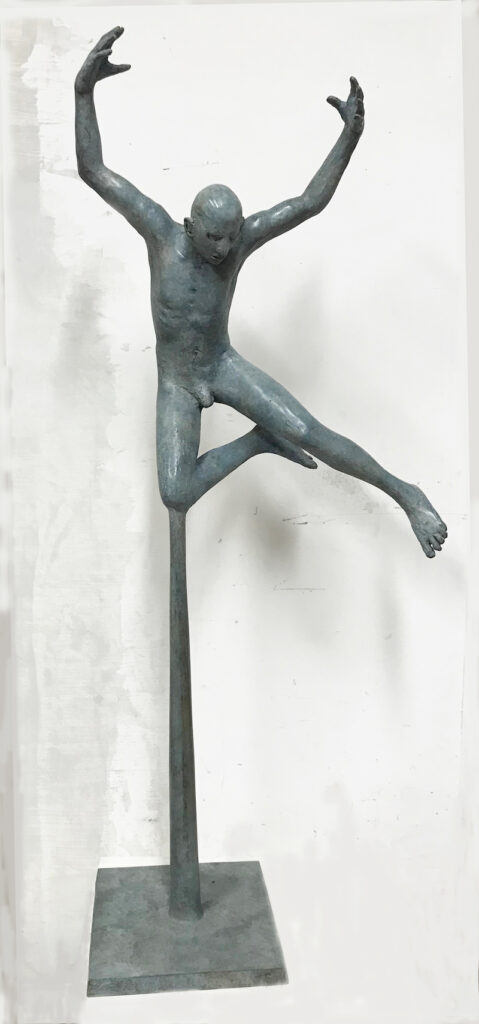Male Jumping Figure on Pin (green patination)